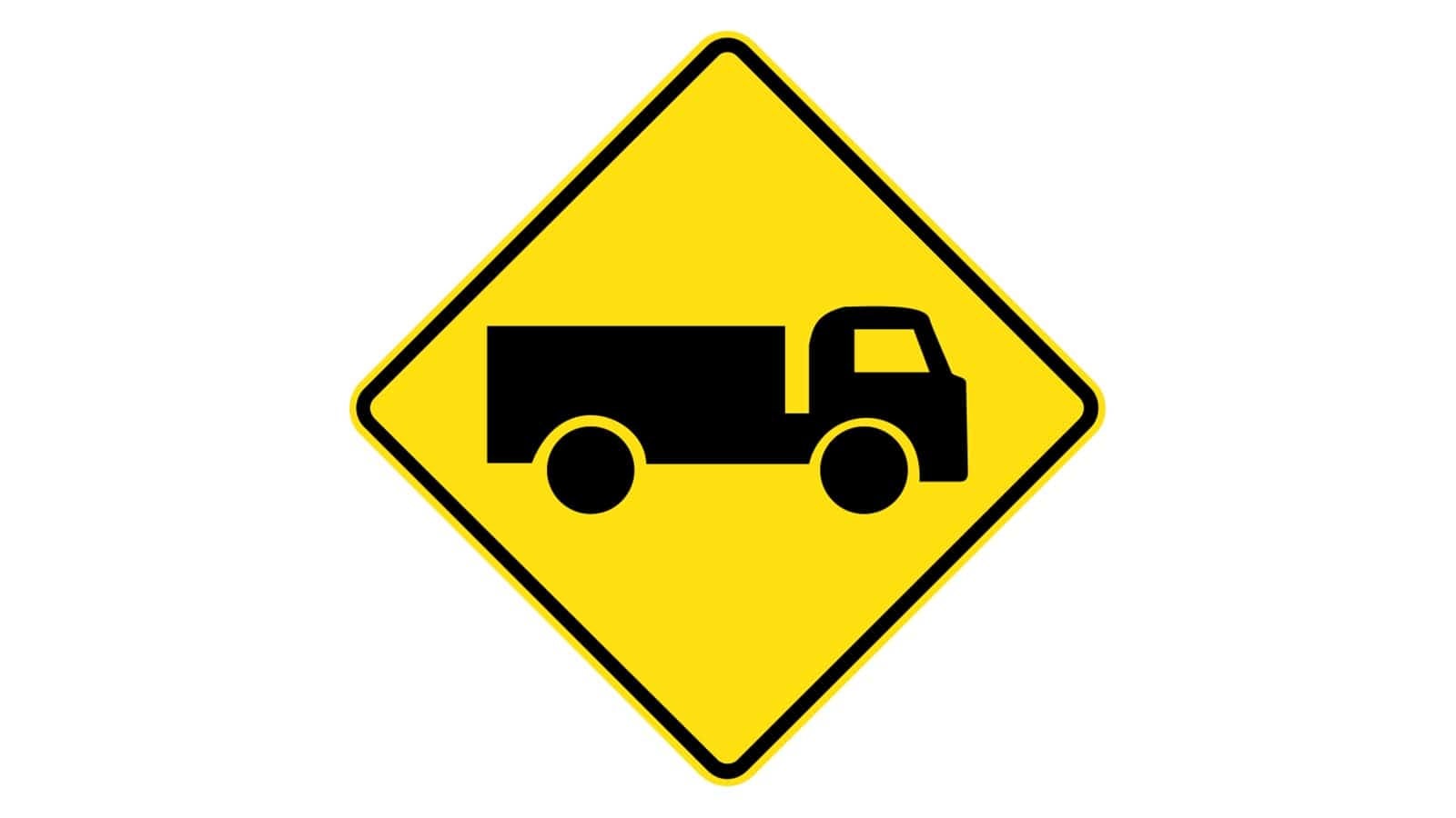 Trucks Crossing or Entering Sign